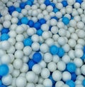 Lots of children's ball pool balls, white and blue