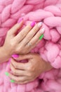 Lots of color gloss manicure hands has different blotches