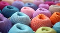 Lots of colorful balls of knitting thread.