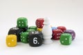 Lots of colorful dices for board games, tabletop games or rpg on light background Royalty Free Stock Photo