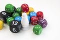 Lots of colorful dices for board games, tabletop games or rpg on light background Royalty Free Stock Photo