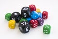 Lots of colorful dices, light background Royalty Free Stock Photo