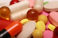 Lots of colorful tablets drug and pills, medical background. Macro. Royalty Free Stock Photo