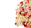 Lots of colorful tablets drug and pills, medical background. Macro. Royalty Free Stock Photo