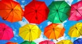 Lots of colorful umbrellas in the sky. City decoration Royalty Free Stock Photo