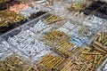 Lots of construction fasteners, screws and bolts of various sizes and types organized in a piles