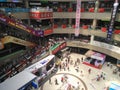 Lots of consumers visiting a big shopping Mall on national holidays