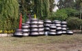 Lots of cooking pot made with aluminium stored on a field