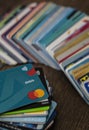 Lots of credit cards, personal debt concept. Visa and Mastercard brands