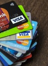 Lots of credit cards, personal debt concept. Visa and Mastercard brands