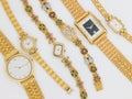 Lots of designed gold watches Royalty Free Stock Photo