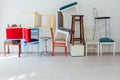 Lots of different chairs in the interior of an empty white room Royalty Free Stock Photo