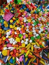 Lots of different colored toys. Beautiful picture of Colorful plastic.