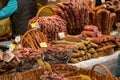 Lots of different kinds of prepared meat on sale, beef, pork products collection, festive market. Buying and selling meat products