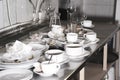 Lots of dirty dishes, after co-op or banquets. The concept of dirty cuisine in the restaurant. Royalty Free Stock Photo