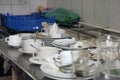 Lots of dirty dishes, after co-op or banquets. The concept of dirty cuisine in the restaurant.