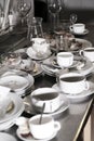 Lots of dirty dishes, after co-op or banquets. The concept of dirty cuisine in the restaurant. Royalty Free Stock Photo