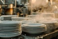 lots of dirty white plates in restaurant