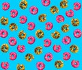 Lots of donuts. Colorful background top view. Yellow, pink color. Circle of bright dessert. Donuts, pink and yellow donut.