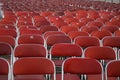 Lots of empty red chairs Royalty Free Stock Photo
