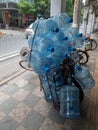 Lots of empty water cans on a bike in Guangzhou, China