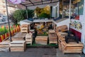 Lots of empty wooden boxes on the street vegetable store