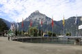 Lots of flags on masts at the lake