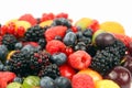 Lots of fresh different berries on a white background Royalty Free Stock Photo