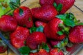 Fresh red strawberries in a glass bowl