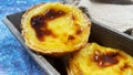 Lots of freshly baked desserts Pastel de nata or Portuguese egg tart. Pastel de Belm is a small pie with a crispy puff