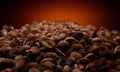Lots of freshly roasted coffee beans. Ungrounded Roasted Coffee Beans, Background Shades Orange Black.3D Rendering Royalty Free Stock Photo