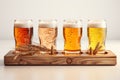 Lots of glasses of different beer on a white background