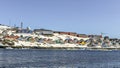 Lots of Inuit huts and colorful houses situated on the rocky coast along the fjord, Nuuk city, Greenland Royalty Free Stock Photo