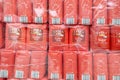 Lots of 1kg packs of Polish brand sugar in storage prepared for sale, sugar production, food necessities many packs of sugar