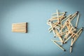 Lots of matches on a blue background. The concept of chaos and order. Selective focus