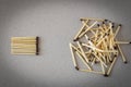 Lots of matches on a light background. The concept of chaos and order. Selective focus