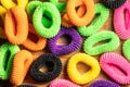 Lots of multi-colored hair elastic bands tied together with crunchies. Hair care and fashion. Royalty Free Stock Photo