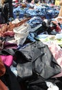 used clothes for sale in the local market without people Royalty Free Stock Photo