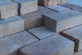 Lots of new white sand-lime air bricks in a stack close-up. Production of building materials Royalty Free Stock Photo