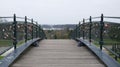 Lots of padlocks on the railing of the footbridge. Padlocks symbolizing love relationships. Lovers bridge, landscape