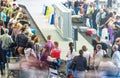 Lots of people getting luggage at airport. Royalty Free Stock Photo