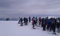 Lots of people waiting for ski lift.