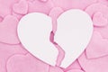 Lots of pink felt hearts with torn paper heart love background