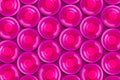 Lots pink plastic bottles. Top view. Products, packaging storage recycling