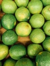 Lots of ripe green lime fruit for eating like a background Royalty Free Stock Photo