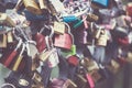 Lots of romantic wedding locks on a bridge in Prague. Toned