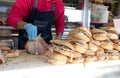 lots of sandwiches stuffed with roast pork