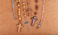 Lots of simple Christian rosaries, multiple crosses, many catholic symbols, objects group. Christianity symbolic, catholicism Royalty Free Stock Photo