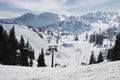 Lots of skiers and snowboarders on the slope at ski resort Royalty Free Stock Photo