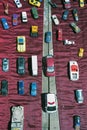 Lots of small vintage toy cars and die cast model cars in a flea market